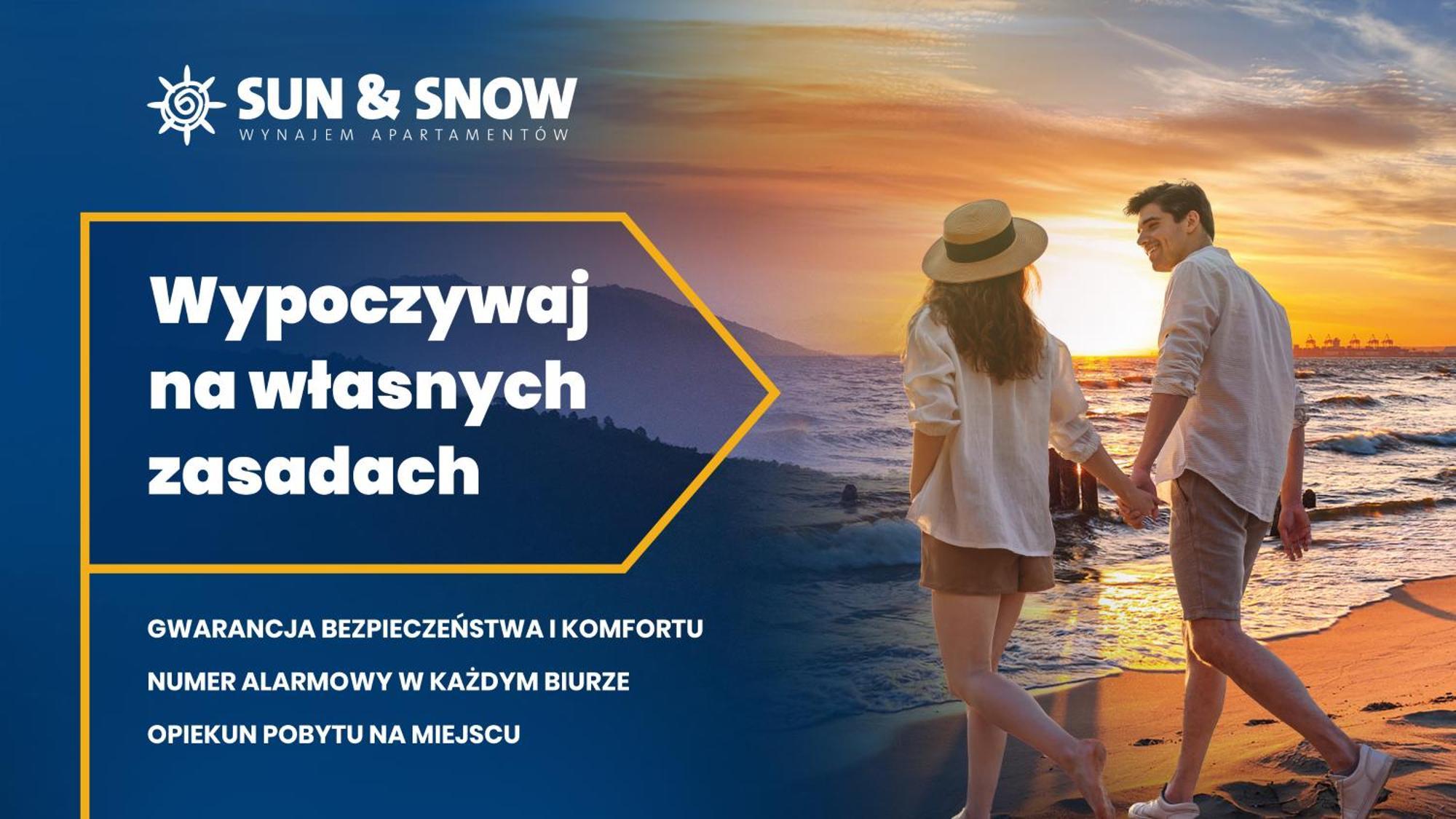 Sun & Snow Na Wydmie W Poblizu Plazy I Molo